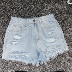 Shein size 4 ripped jeans shorts. Pack of two one light and dark wash.